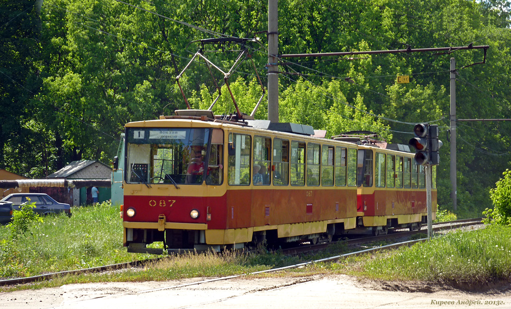 087 087