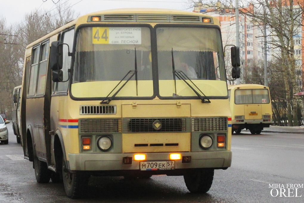  709  57