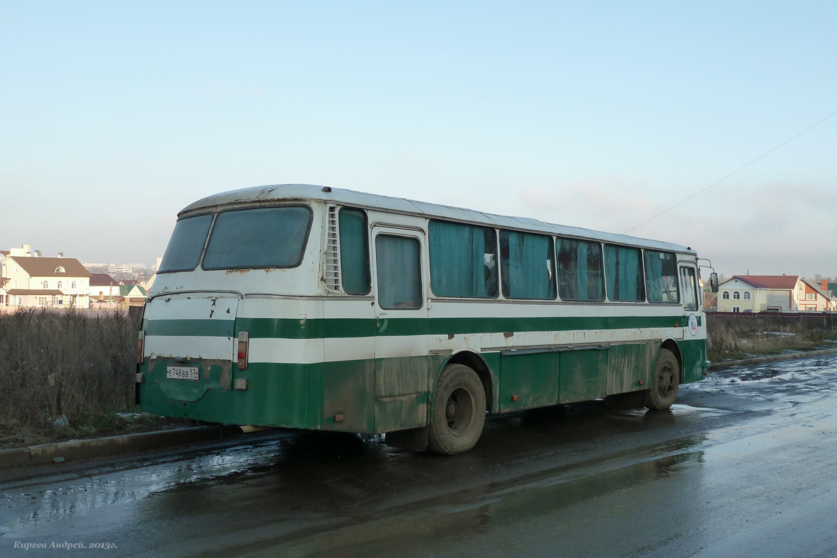  748  57