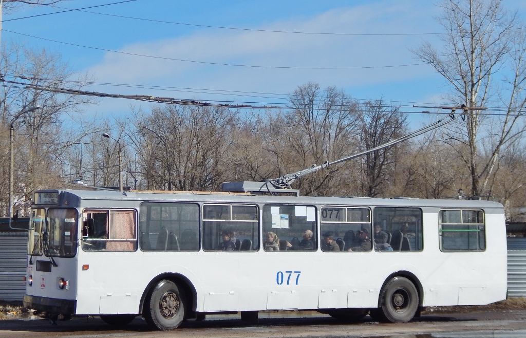 077