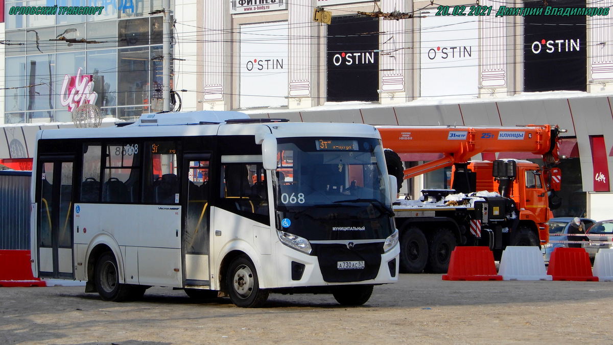 068 068
